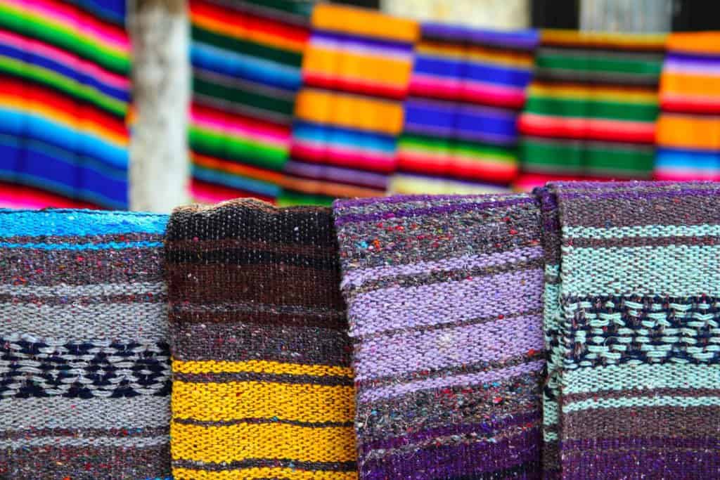 most vendors sell these brightly colored blankets in los algodones and other border towns in Mexico